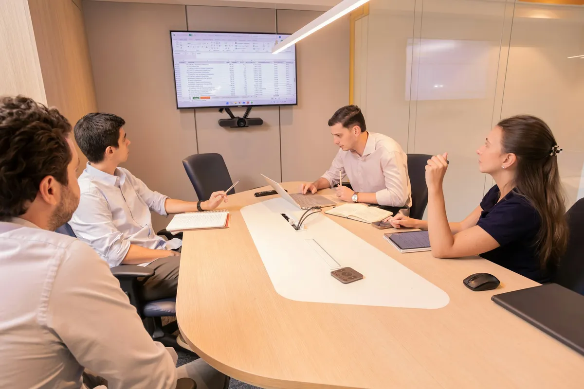 Business team working around a meeting table