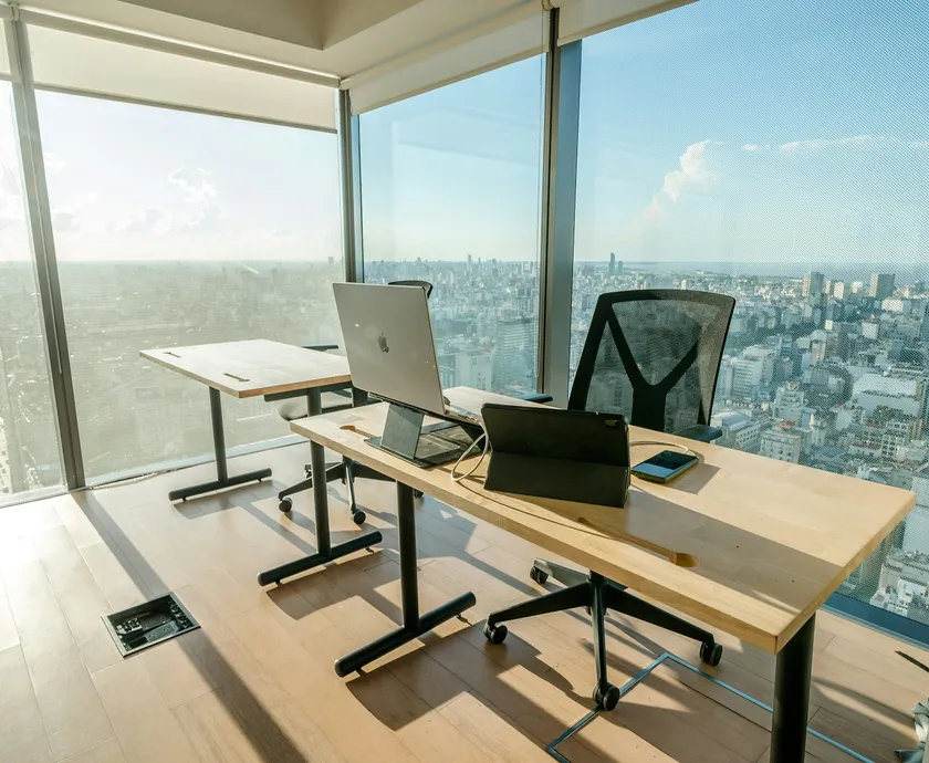 Office overlooking the city through large windows
